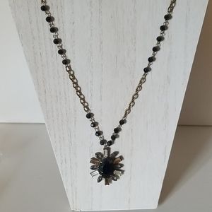 Long ornate necklace